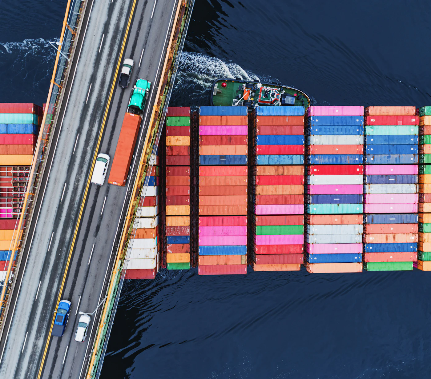 Container ship passing bridge