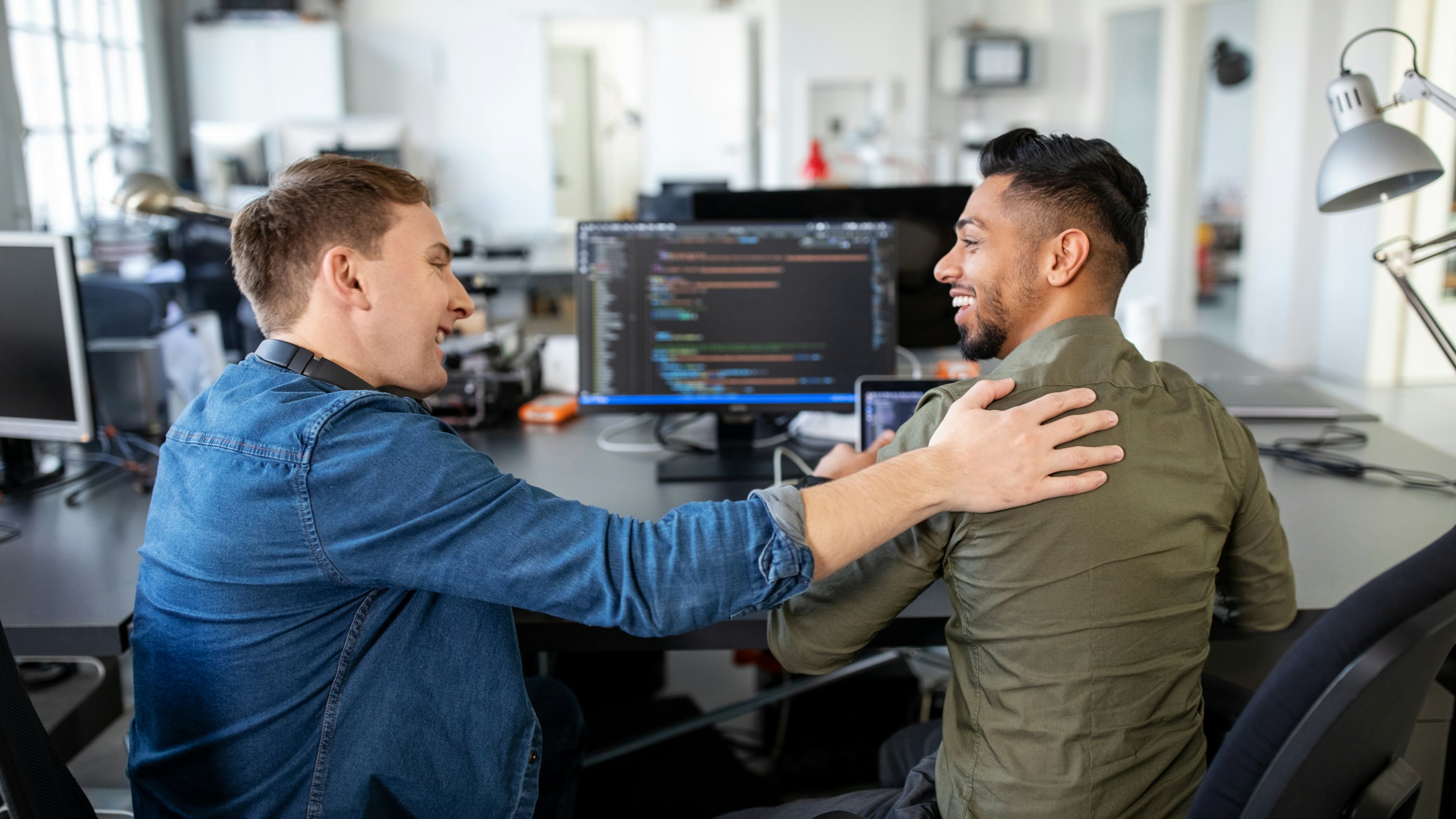 Cyber security engineers smiling