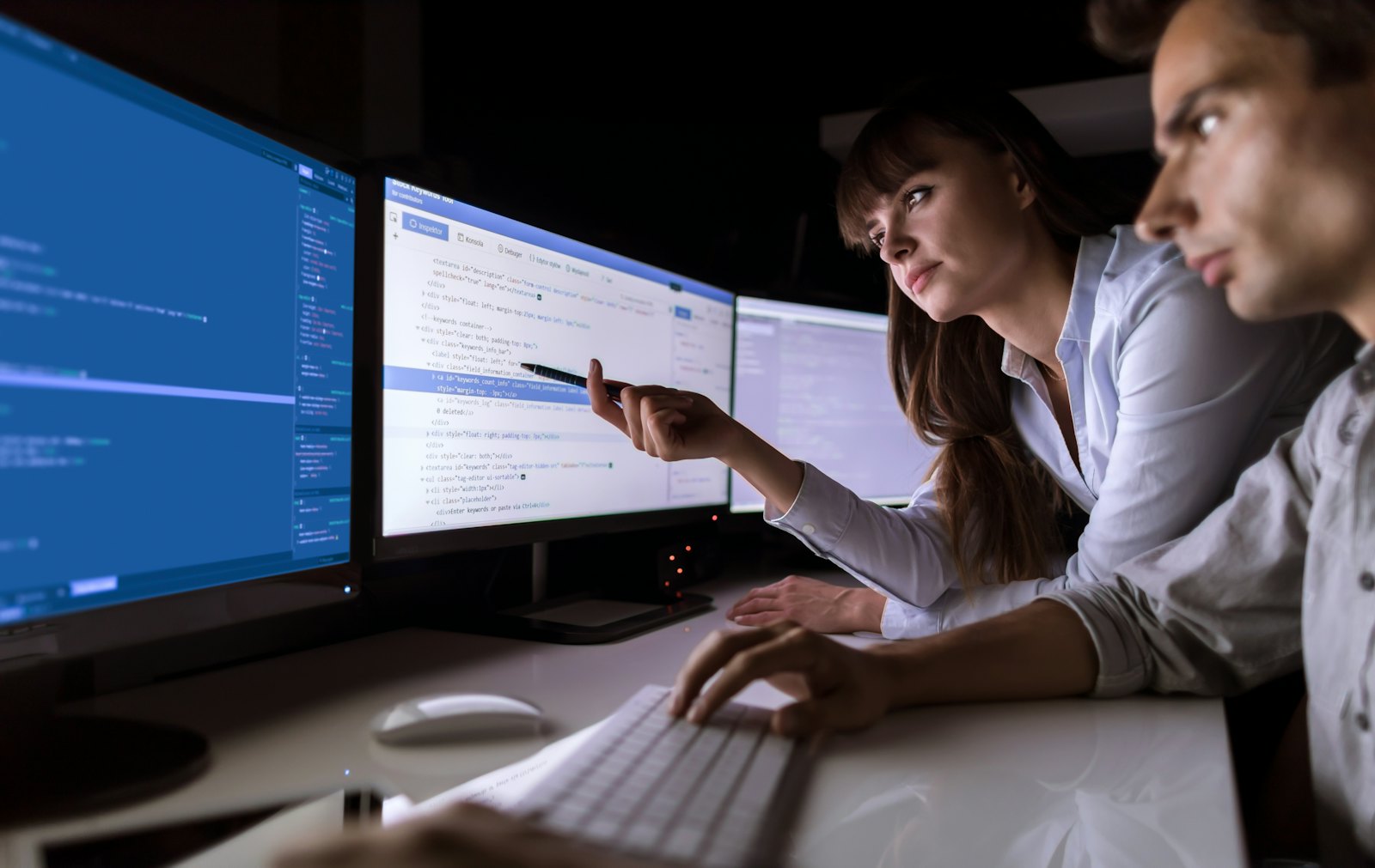 Cybersecurity engineers looking at latest cybersecurity challenges