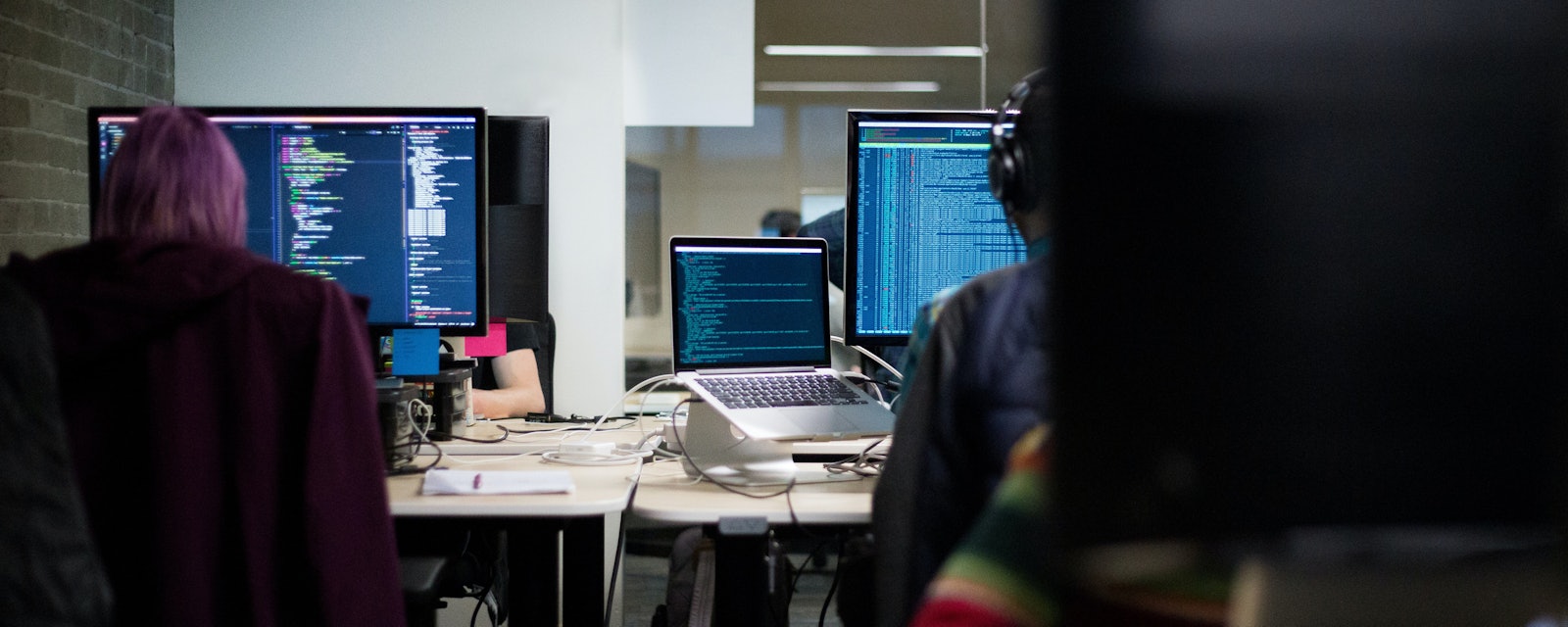 Developers behind screens