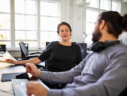 Male and female engineer discussion