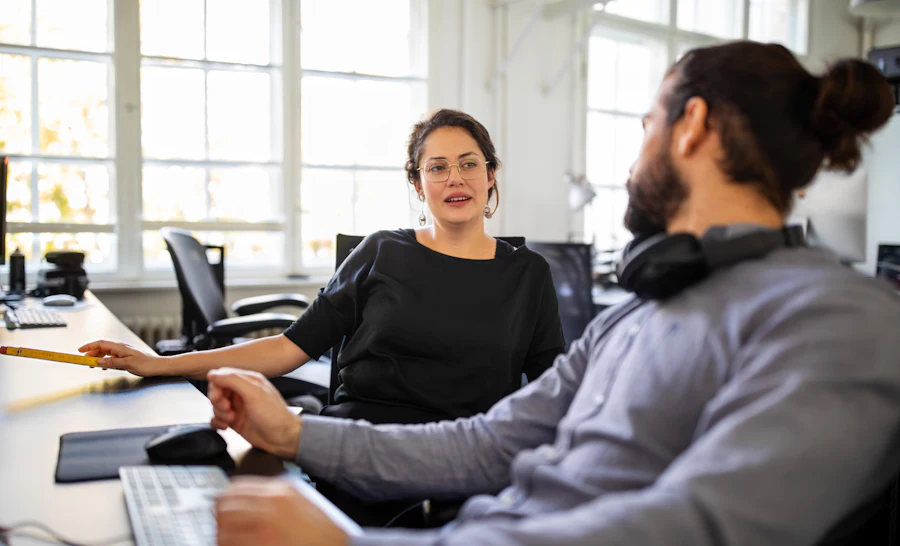 Male and female engineer discussion