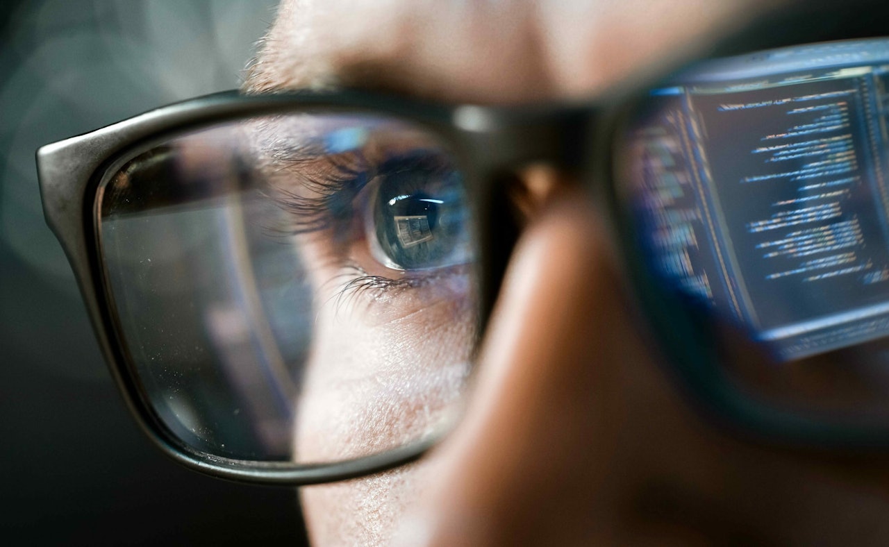 Security engineer glasses closeup