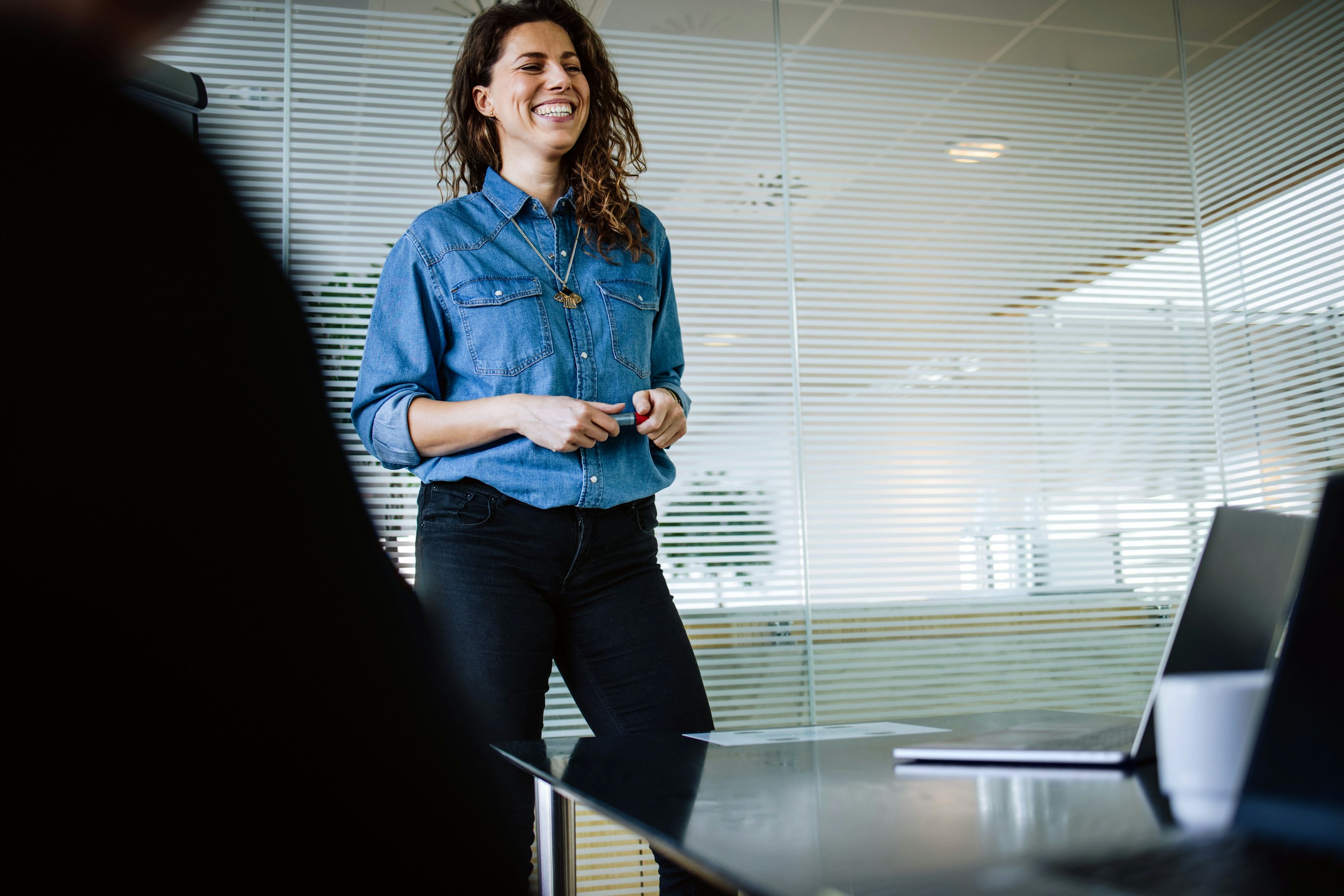 Smiling female engineer meeting