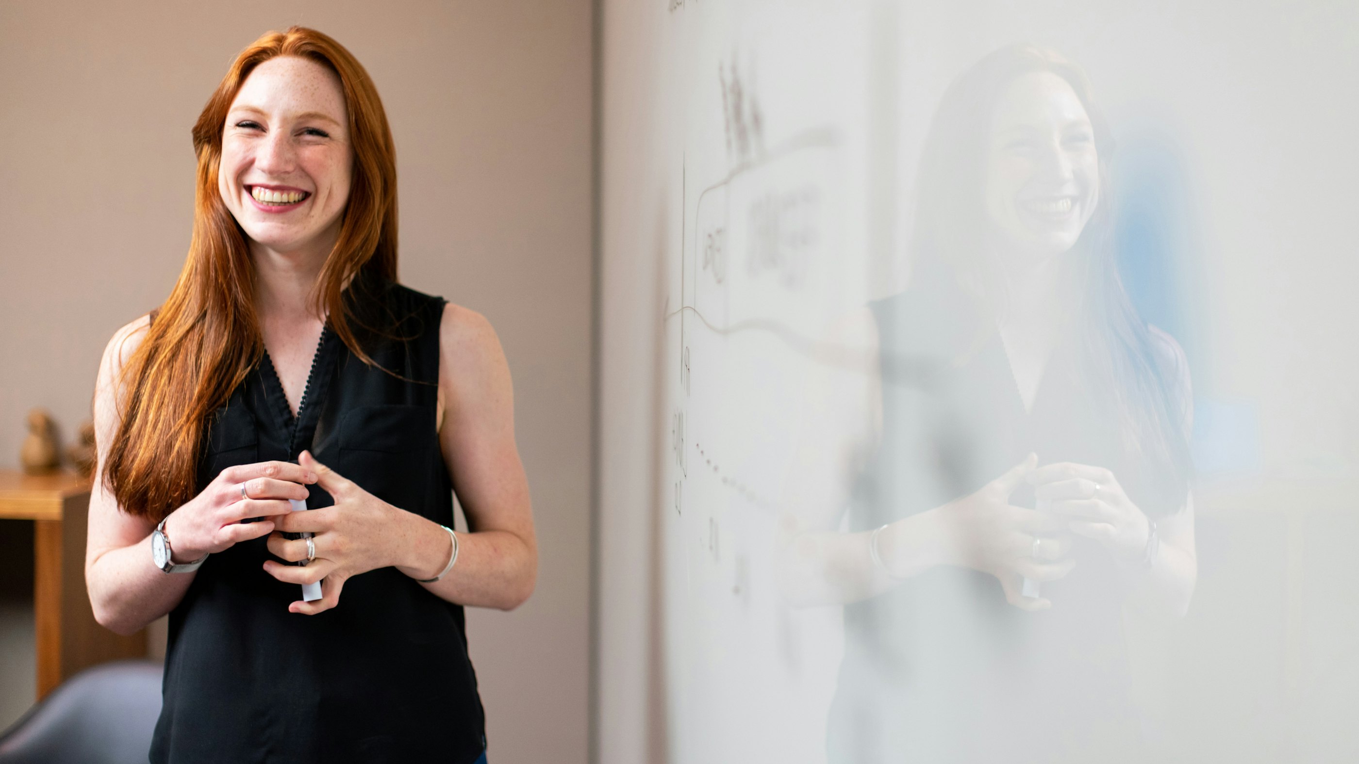 Smiling engineer whiteboard