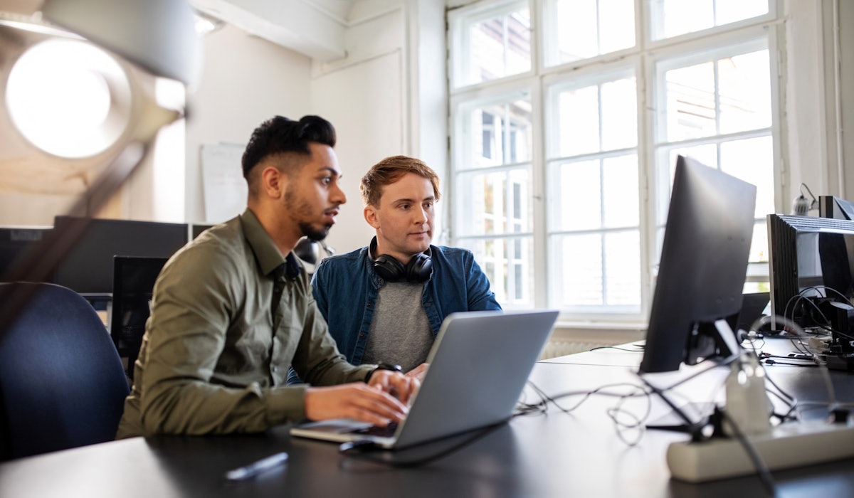 Two young engineers office