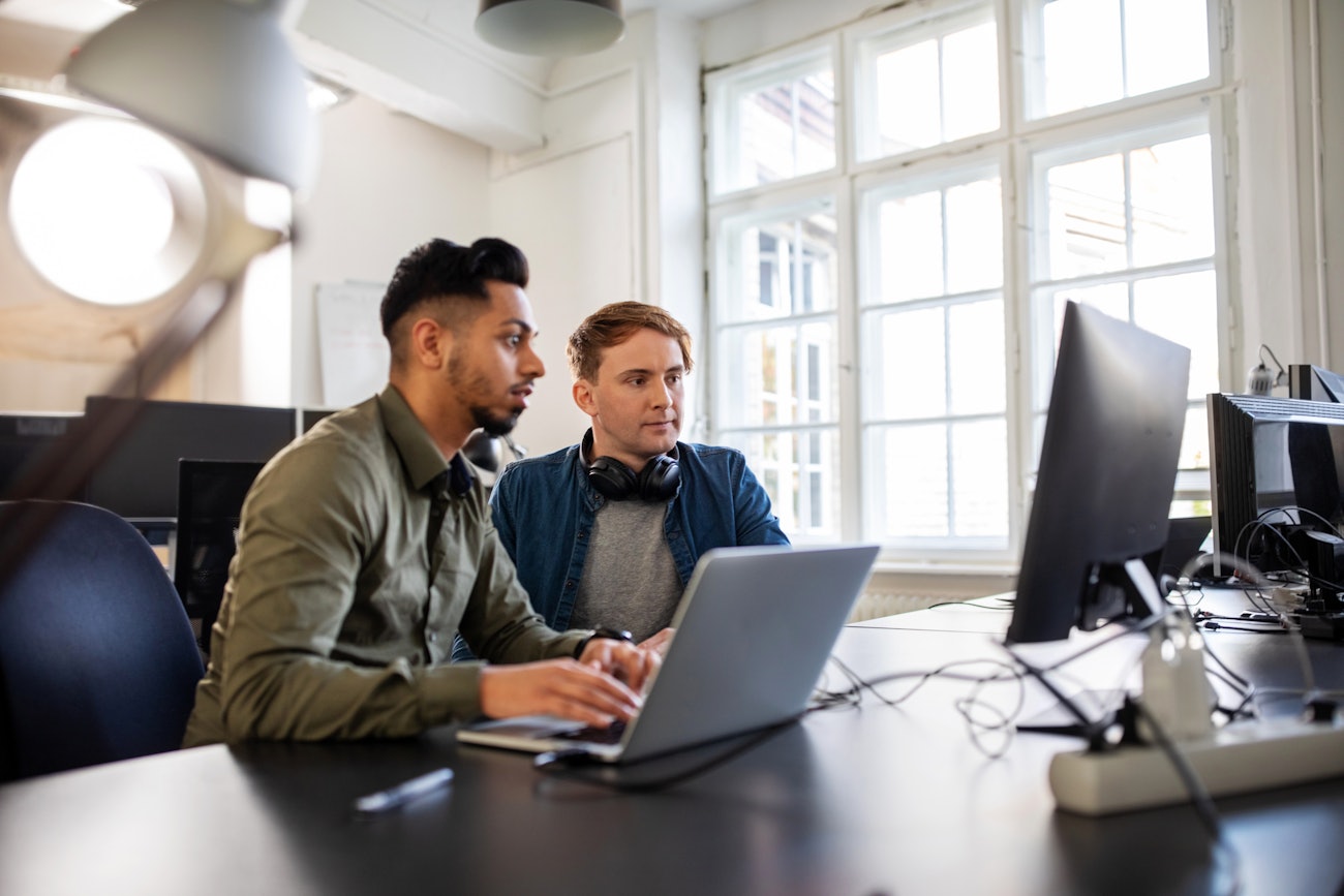 Two young engineers office