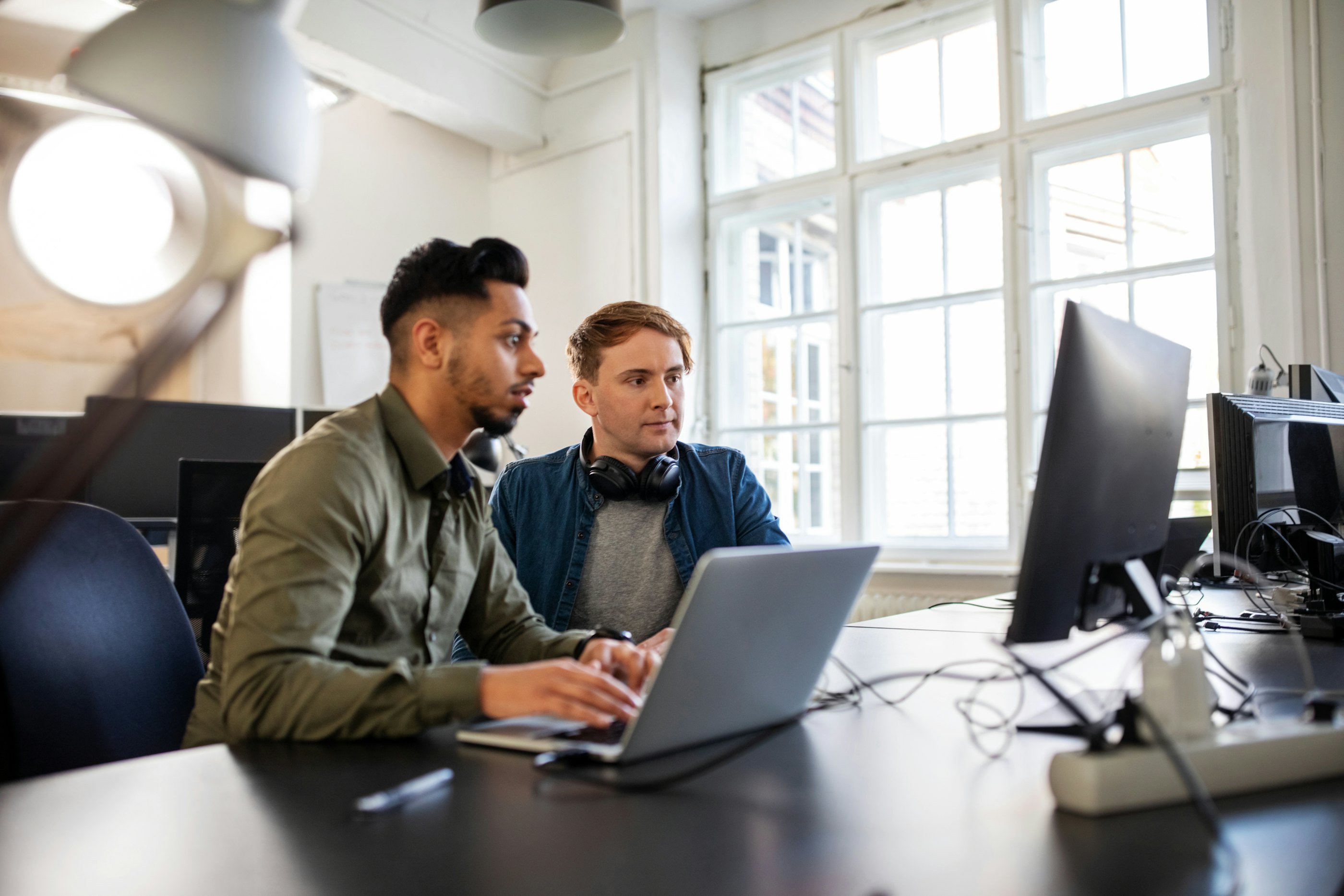 Two young engineers office