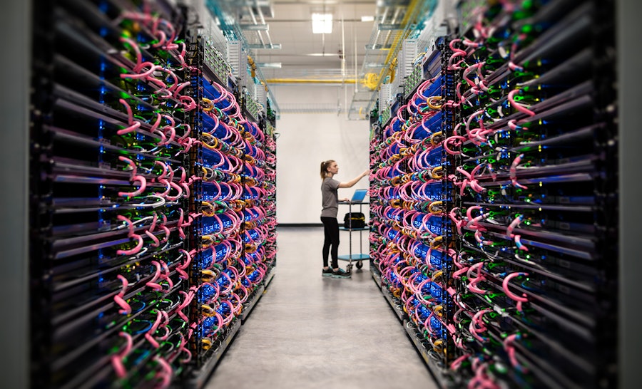 Woman working in datacenter