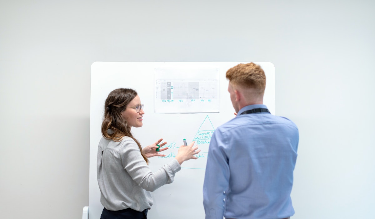 Young engineers whiteboard design