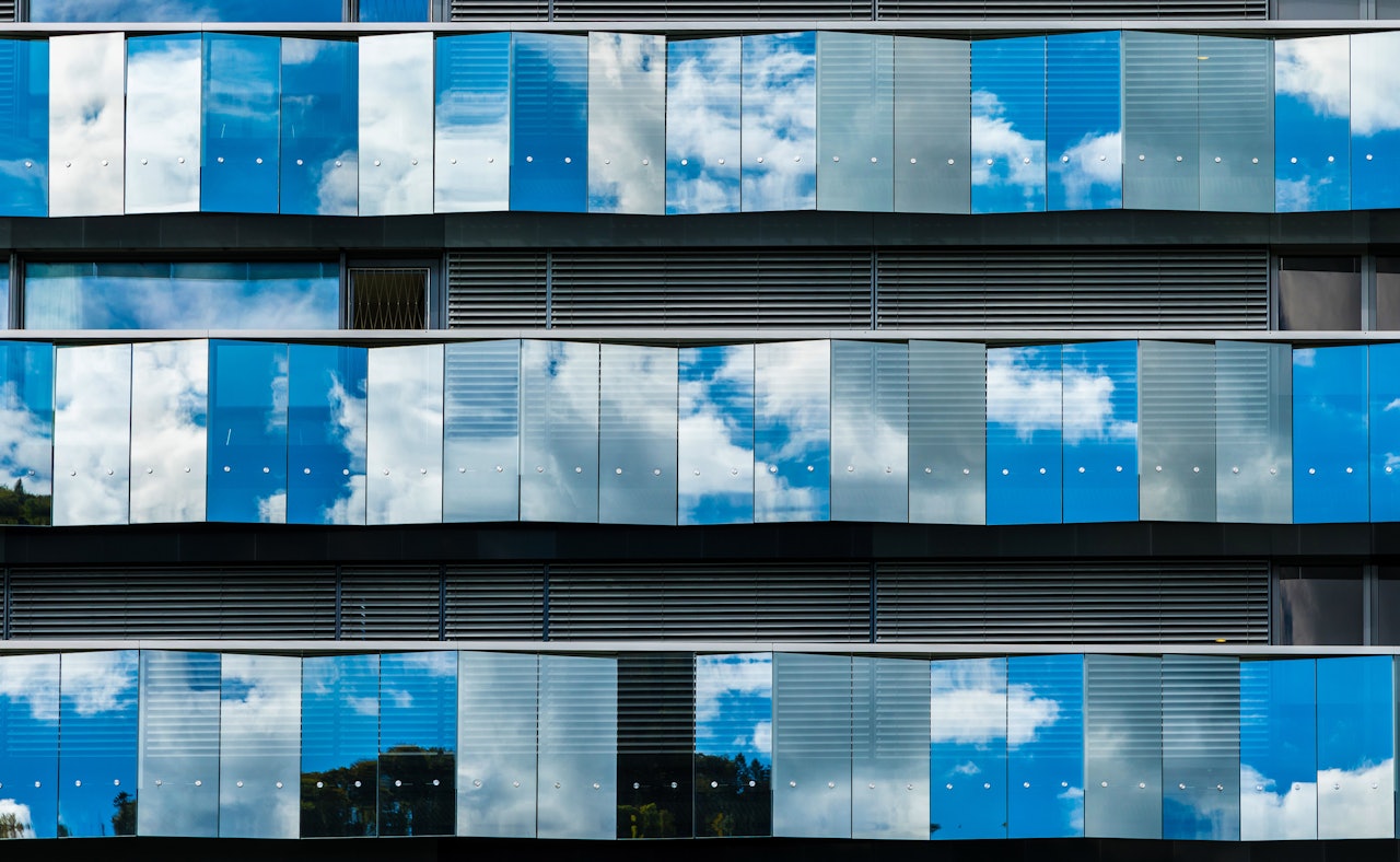 Office facade cloud reflection