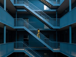 Woman going up stairway