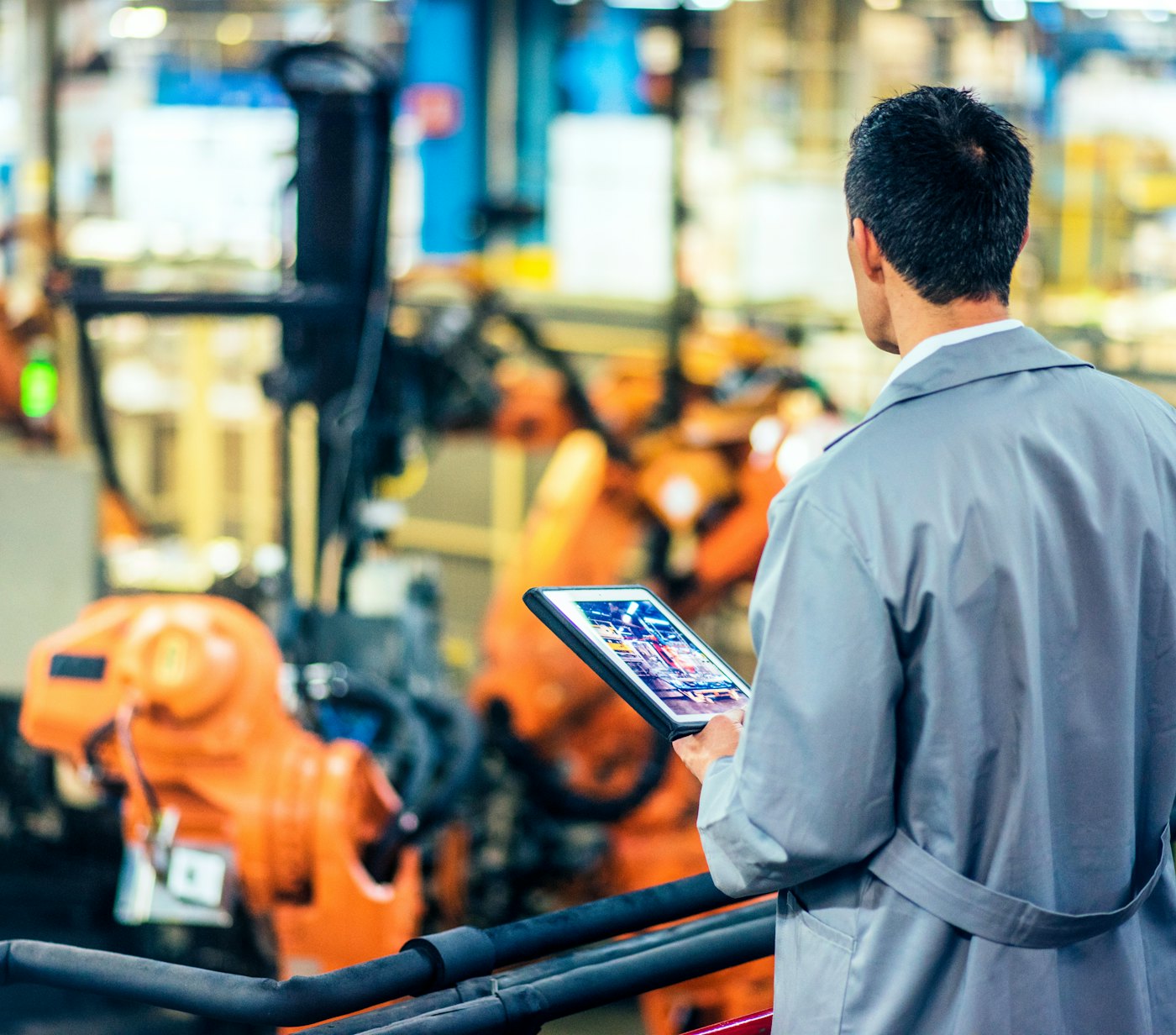 Engineer oversees factory floor