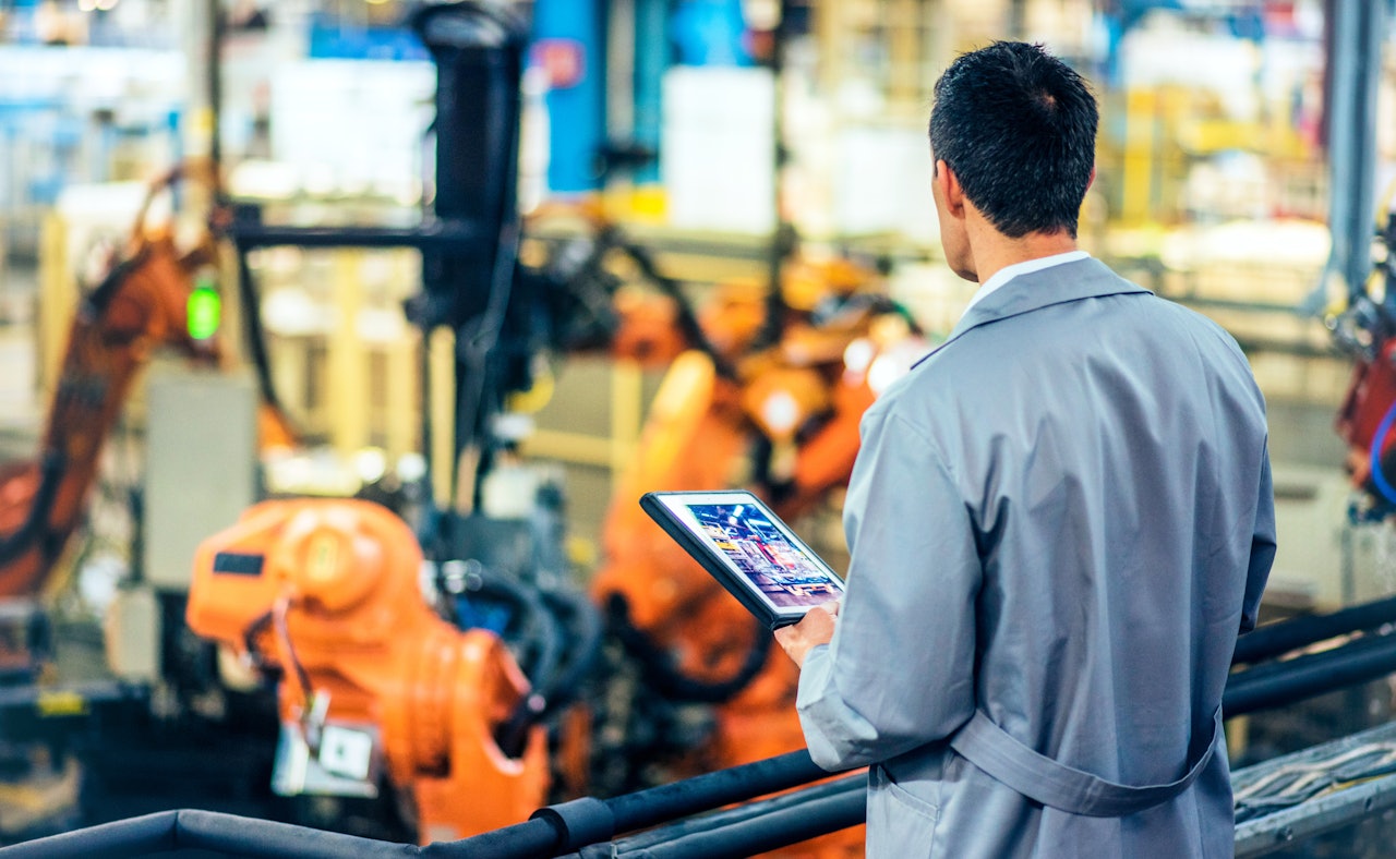 Engineer oversees factory floor