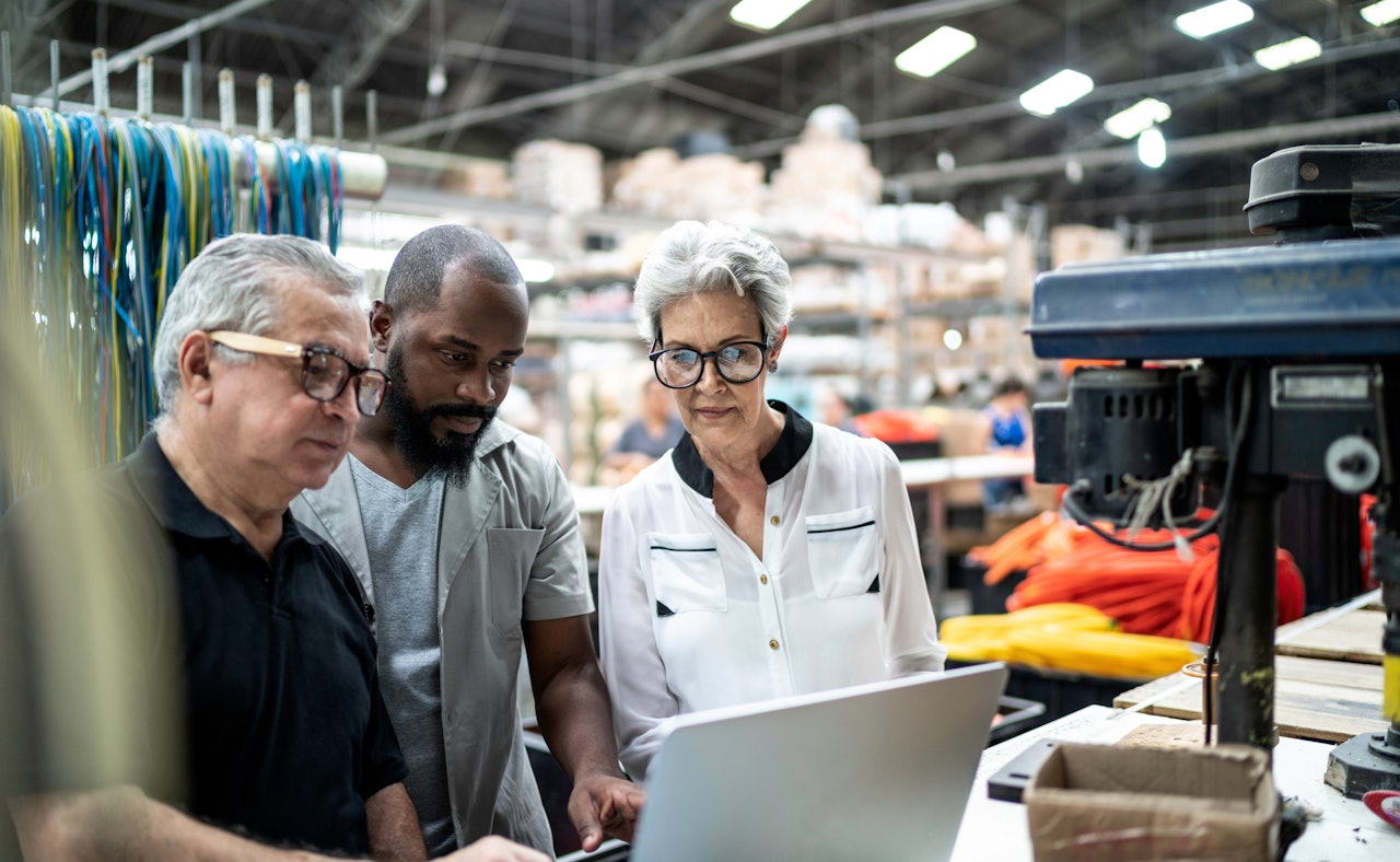 Manufacturing employees factory laptop