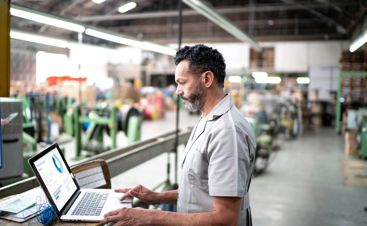 Manufacturing factory worker laptop