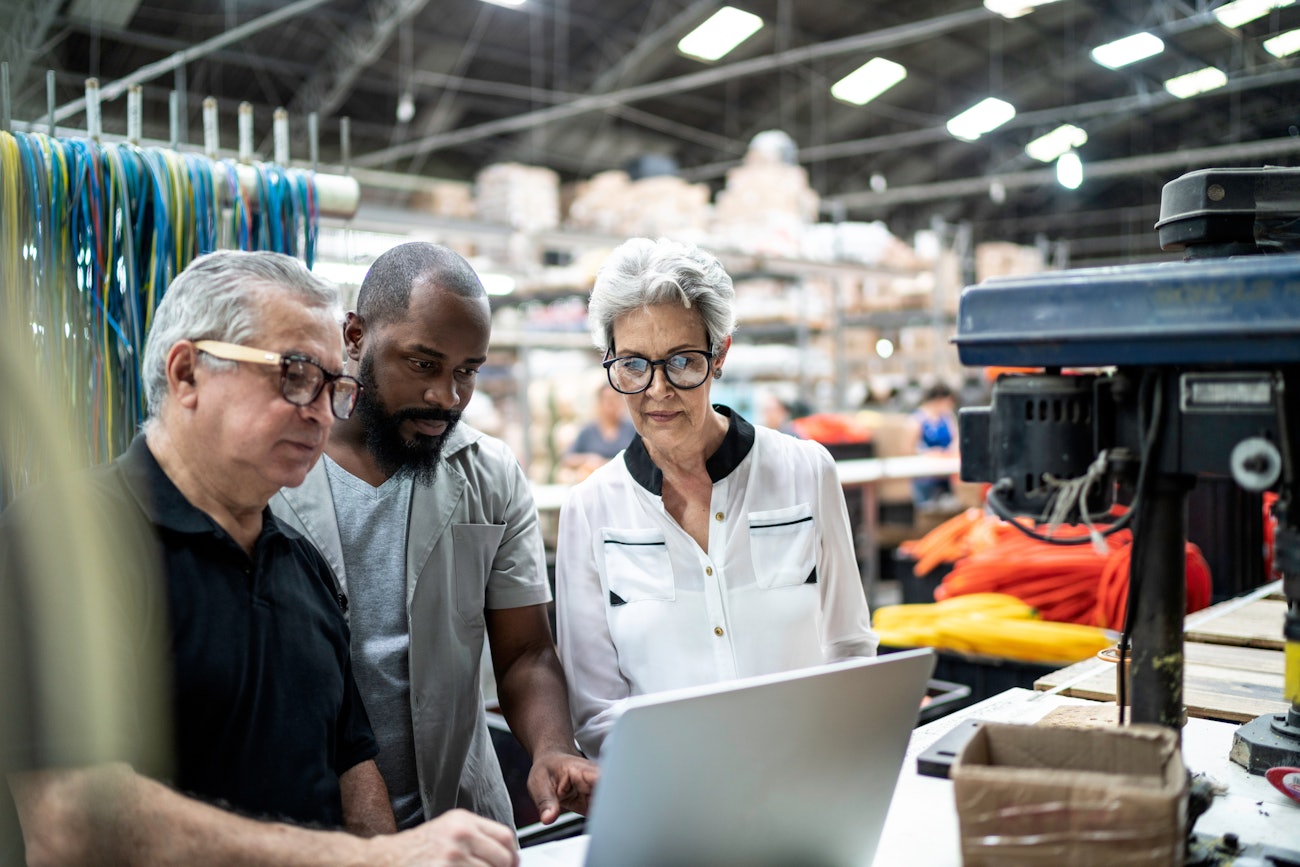 Manufacturing employees factory laptop