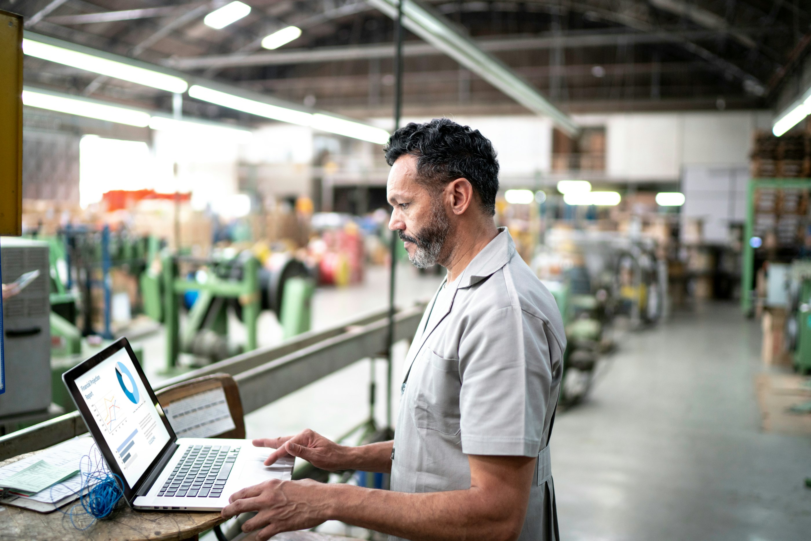 Manufacturing factory worker laptop