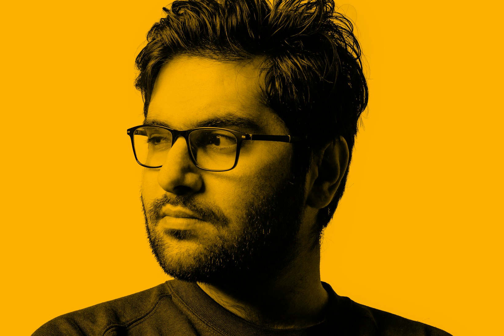 Portrait of ethnic man looking away