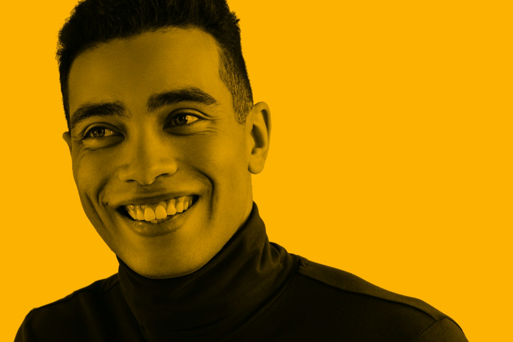 Portrait of young ethnic male