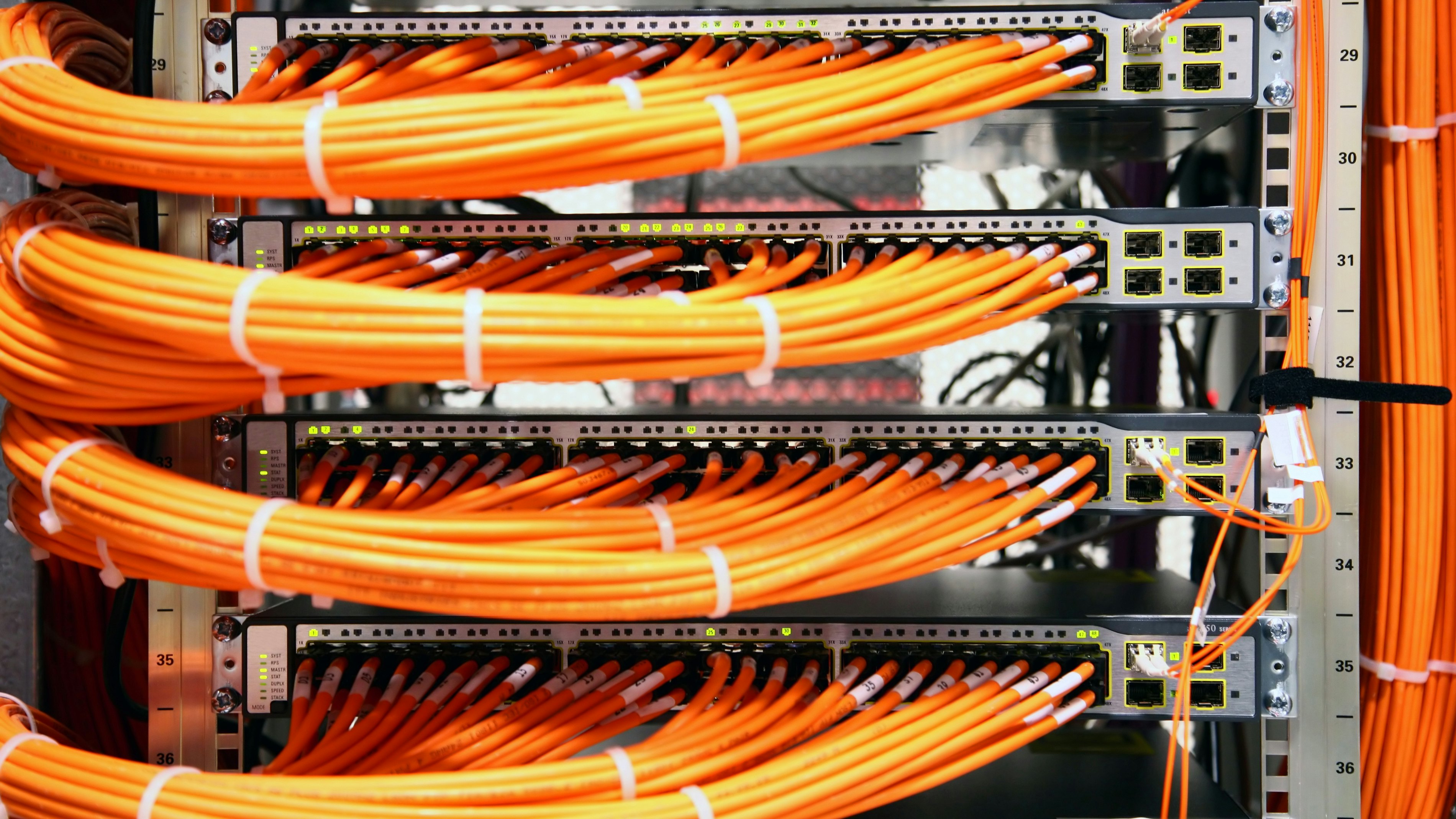 Orange network cables switches