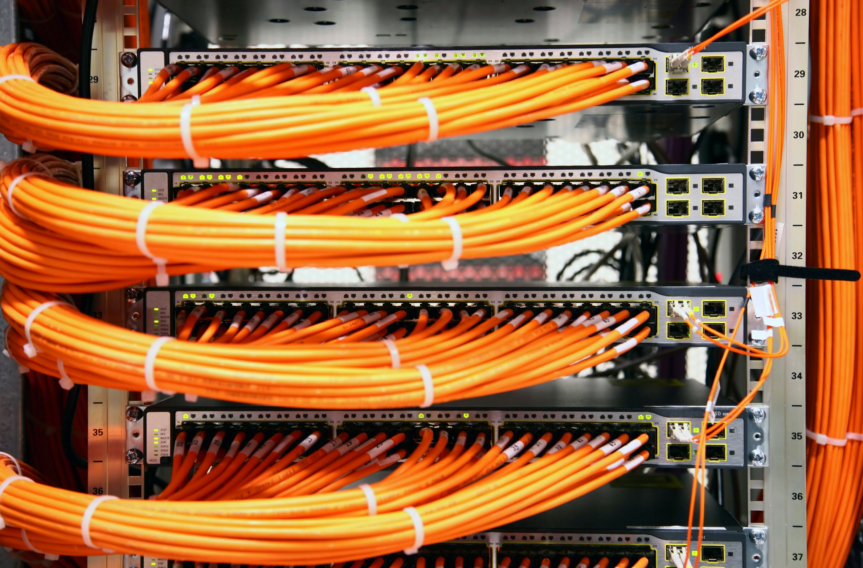 Orange network cables switches