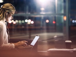 Woman in coffee house laptop