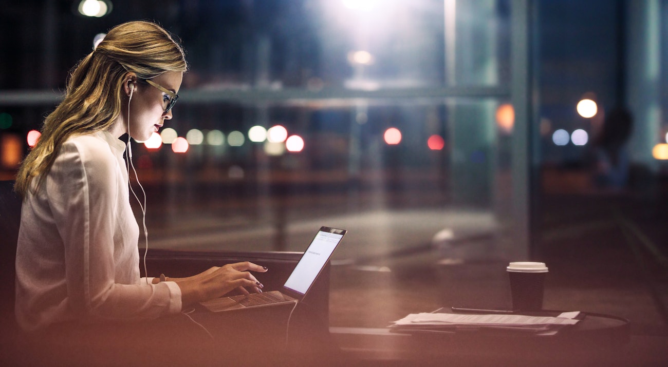 Woman in coffee house laptop