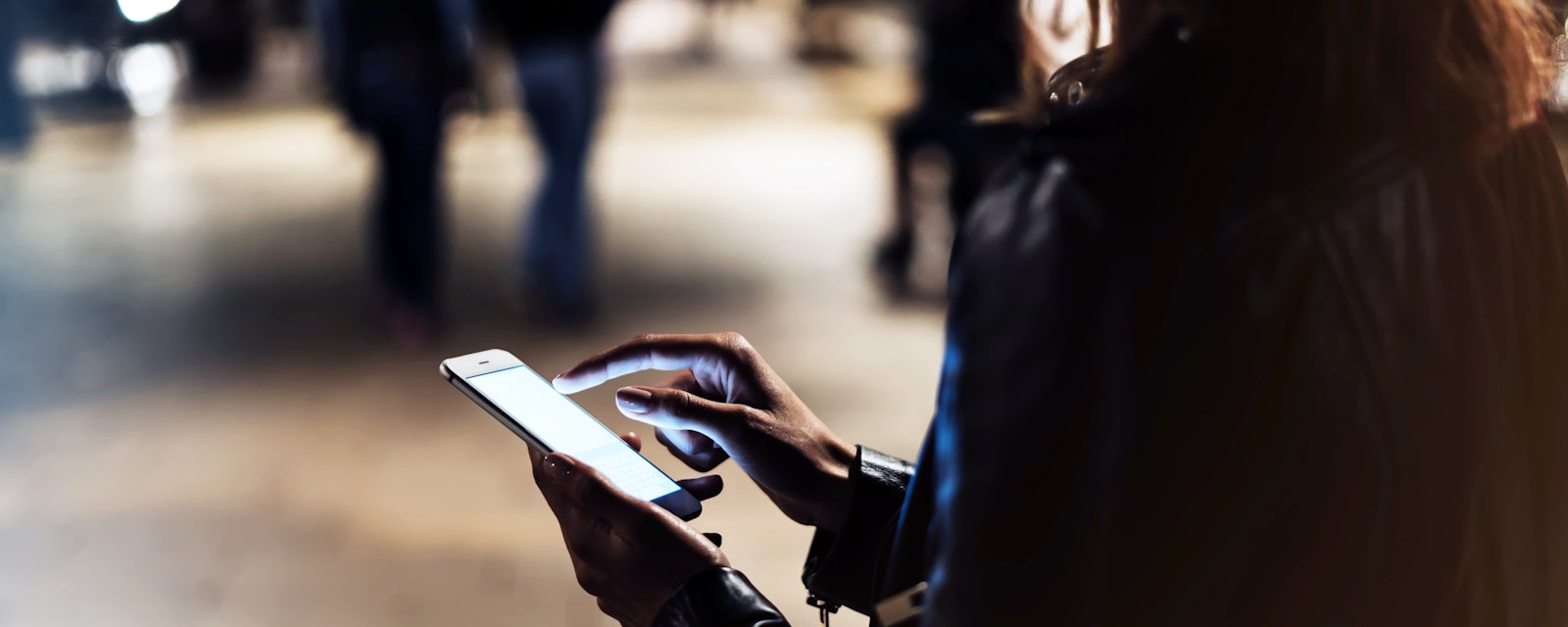 Woman smartphone at night