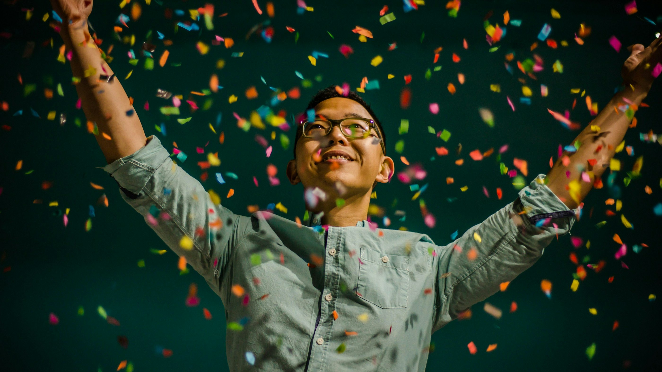 Man celebrating with confetti