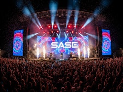 Firefly Gemini Flash Large stage for a rock concert with a raving crowd and lights smoke and a large LED 443531