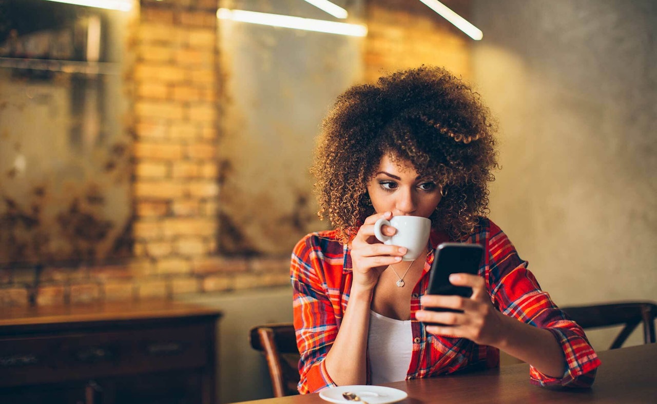 Girl drinking coffee phone