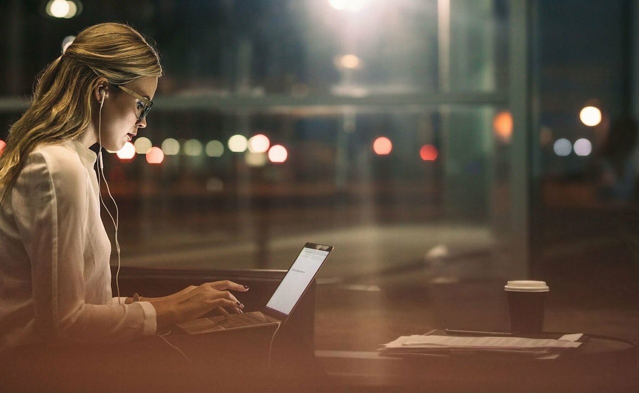 Girl working laptop coffeehouse